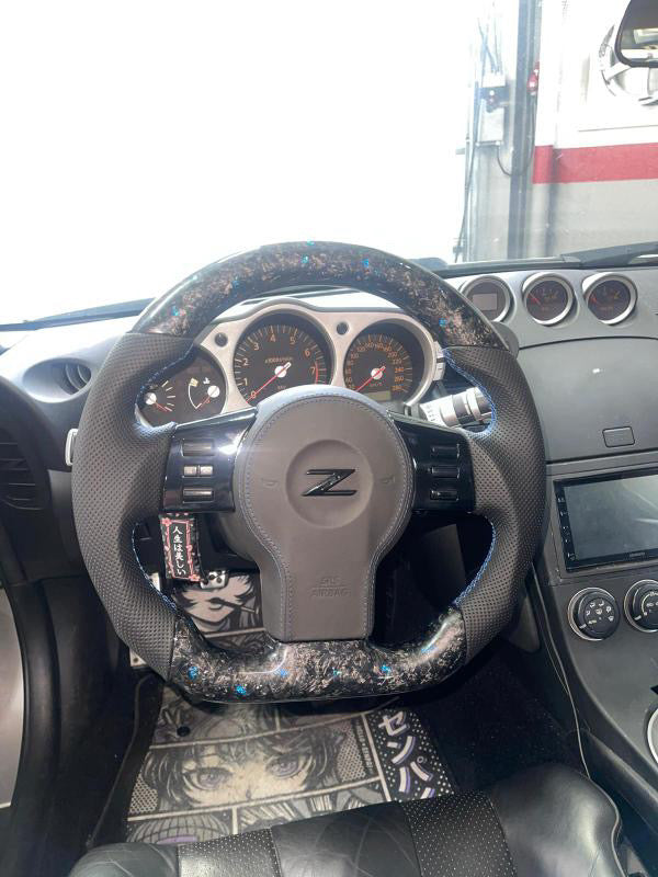Volant sport Nissan 350z en carbone forgé et paillettes de couleur