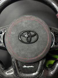 Volant sport Toyota Supra en carbone